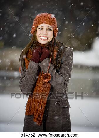 Woman outdoors in winter smiling View Large Photo Image Stock Image - Woman outdoors in winter smiling. Fotosearch