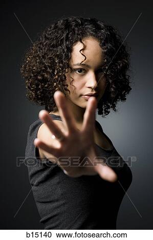 Woman reaching hand toward camera View Large Photo Image Stock Image - Woman reaching hand toward camera. Fotosearch