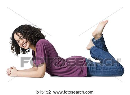 Woman reclining and smiling View Large Photo Image Stock Image - Woman reclining and smiling. Fotosearch