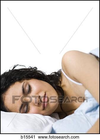 Woman sleeping in bed View Large Photo Image Stock Image - Woman sleeping in bed. Fotosearch