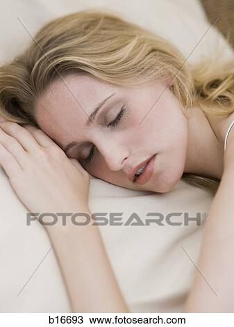 Stock Image - Woman sleeping. Fotosearch
