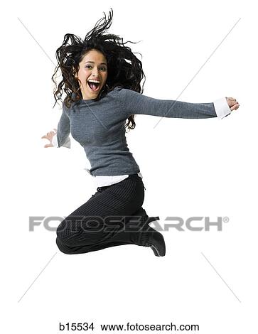 Picture - Woman smiling and jumping. Fotosearch