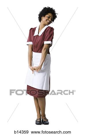 Woman smiling in maid uniform View Large Photo Image Stock Photo - Woman smiling in maid uniform. Fotosearch
