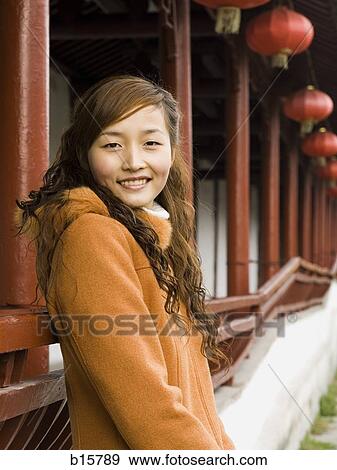 Woman smiling outdoors View Large Photo Image Stock Photo - Woman smiling outdoors. Fotosearch