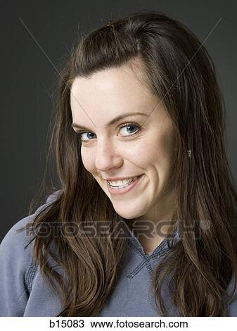 Woman smiling with dental retainer View Large Photo Image Stock Image - Woman smiling with dental retainer. Fotosearch