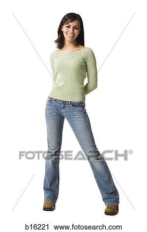 Woman standing and smiling View Large Photo Image Stock Image - Woman standing and smiling. Fotosearch