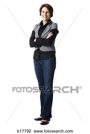 Woman standing with arms folded. View Large Photo Image Stock Image - Woman standing with arms folded.. Fotosearch