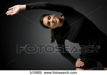 Woman stretching View Large Photo Image Stock Photography - Woman stretching. Fotosearch
