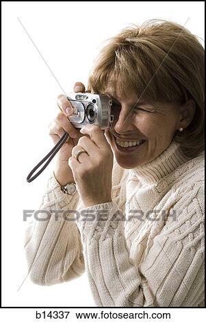 woman taking picture View Large Photo Image Stock Photo - woman taking picture. Fotosearch