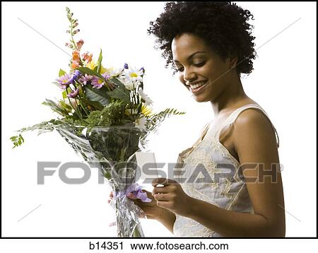 woman with flowers View Large Photo Image Stock Image - woman with flowers. Fotosearch