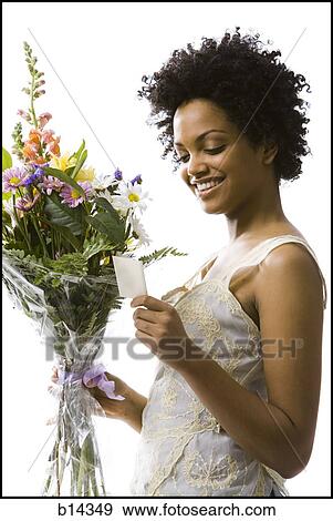 Stock Photo - woman with flowers. Fotosearch