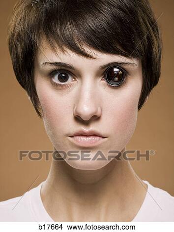 Woman with lens in eyeball closeup View Large Photo Image Picture - Woman with lens in eyeball closeup. Fotosearch