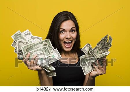 Stock Photo - woman with money. Fotosearch