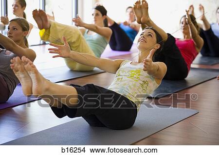 Picture - Women at yoga class. Fotosearch