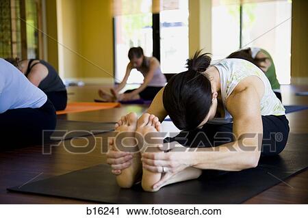 Women at yoga class View Large Photo Image Stock Image - Women at yoga class. Fotosearch