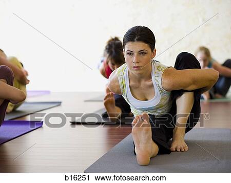 Women at yoga class View Large Photo Image Stock Image - Women at yoga class. Fotosearch