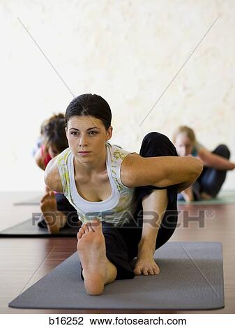 Women at yoga class View Large Photo Image Stock Image - Women at yoga class. Fotosearch