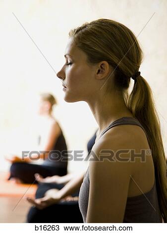 Women at yoga class View Large Photo Image Stock Image - Women at yoga class. Fotosearch