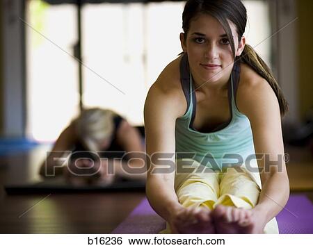 Stock Photograph - Women at yoga class. Fotosearch