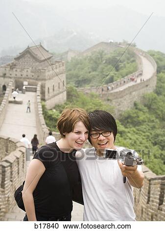 Young couple at the Great Wall of China. View Large Photo Image Stock Image - Young couple at the Great Wall of China.. Fotosearch