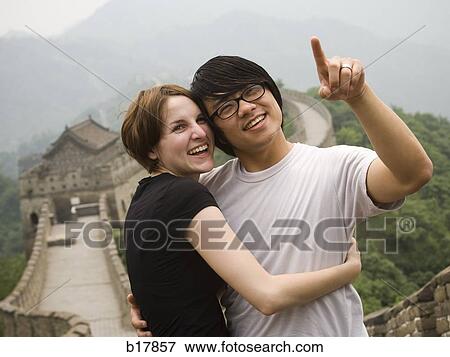 Young couple at the Great Wall of China. View Large Photo Image Stock Photo - Young couple at the Great Wall of China.. Fotosearch
