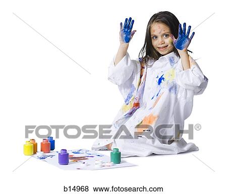 Stock Photo - Young girl finger painting. Fotosearch