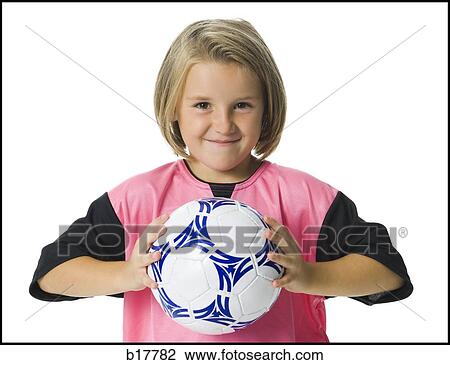 Young girl in a soccer uniform with ball. View Large Photo Image Stock Image - Young girl in a soccer uniform with ball.. Fotosearch