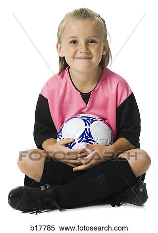 Young girl in a soccer uniform with ball. View Large Photo Image Stock Photography - Young girl in a soccer uniform with ball.. Fotosearch