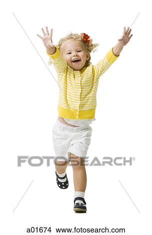 Young girl in a yellow sweater. View Large Photo Image Picture - Young girl in a yellow sweater.. Fotosearch