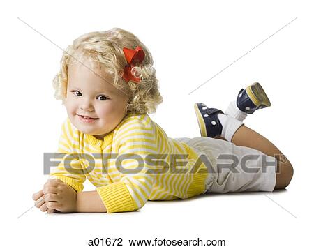 Young girl in a yellow sweater. View Large Photo Image Stock Image - Young girl in a yellow sweater.. Fotosearch