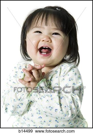Young girl smiling View Large Photo Image Stock Photo - Young girl smiling. Fotosearch
