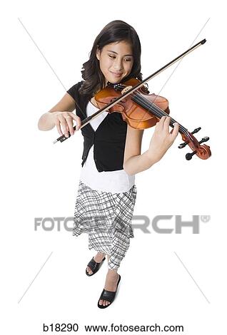 A young woman plays the violin. View Large Photo Image Stock Image - A young woman plays the violin.. Fotosearch