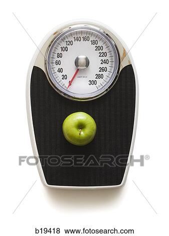 apple on a scale View Large Photo Image Stock Photo - apple on a scale. Fotosearch