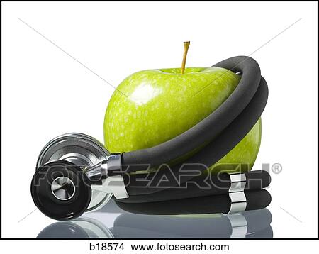Apple wrapped in a stethopscope. View Large Photo Image Picture - Apple wrapped in a stethopscope.. Fotosearch