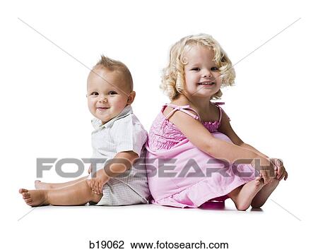 Stock Image - baby boy and toddler girl.. Fotosearch