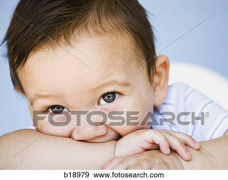 baby boy with arm in mouth. View Large Photo Image Stock Photo - baby boy with arm in mouth.. Fotosearch