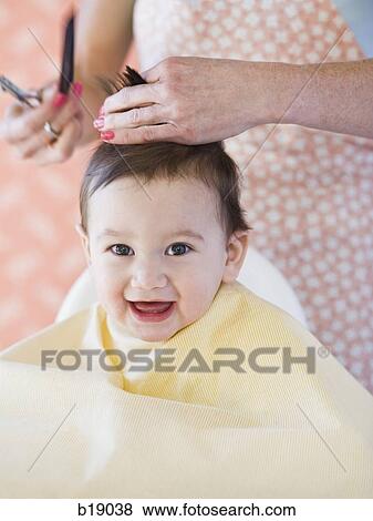 Baby getting a haircut. View Large Photo Image Stock Photo - Baby getting a haircut.. Fotosearch