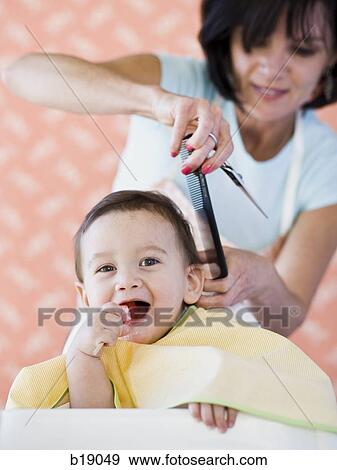 Baby getting a haircut. View Large Photo Image Stock Photo - Baby getting a haircut.. Fotosearch