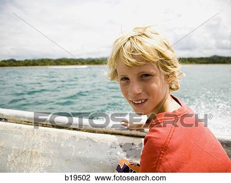 boy on a boat View Large Photo Image Stock Image - boy on a boat. Fotosearch