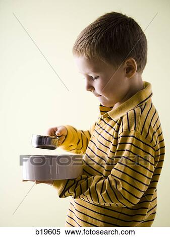 boy with a bowl and measuring cup View Large Photo Image Stock Photography - boy with a bowl and measuring cup. Fotosearch