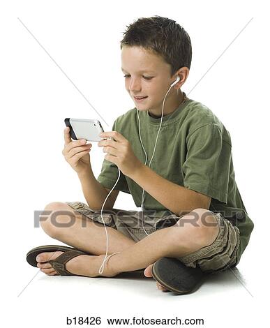 Boy with iphone View Large Photo Image Stock Photograph - Boy with iphone. Fotosearch