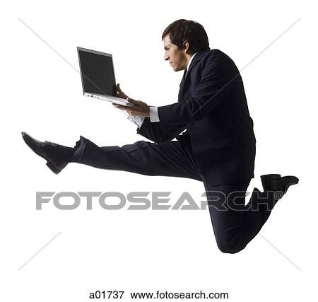 businessman jumping in the air View Large Photo Image Stock Photo - businessman jumping in the air. Fotosearch