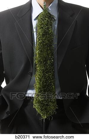 businessman with a tie made of grass View Large Photo Image Stock Image - businessman with a tie made of grass. Fotosearch