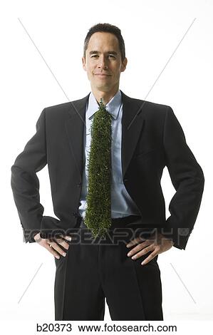 Stock Image - businessman with a tie made of grass. Fotosearch