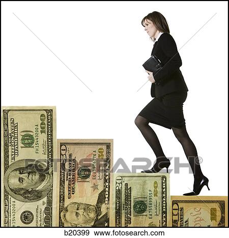 businessperson climbing a staircase of money View Large Photo Image Stock Photo - businessperson climbing a staircase of money. Fotosearch