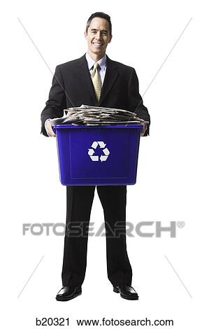 businessperson holding a recycling bin View Large Photo Image Stock Image - businessperson holding a recycling bin. Fotosearch