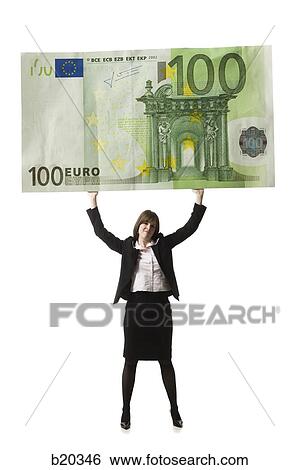 businessperson holding up a bank note View Large Photo Image Stock Photograph - businessperson holding up a bank note. Fotosearch