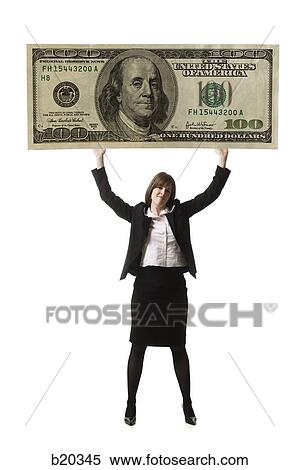 businessperson holding up a bank note View Large Photo Image Stock Photography - businessperson holding up a bank note. Fotosearch