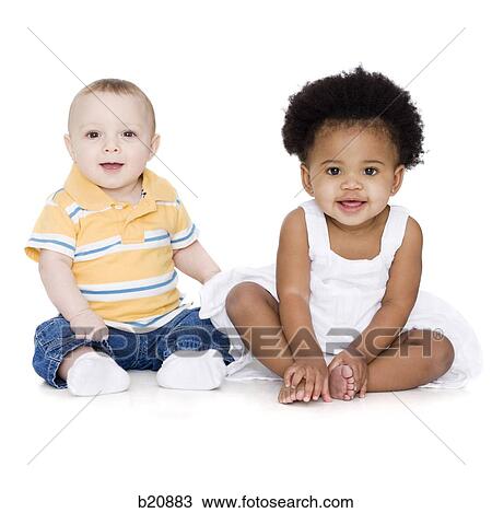 Stock Image - Caucasian Appearance, 6-11 Months, Baby girls, baby boys, African Ethnicity, 12-17 months. Fotosearch