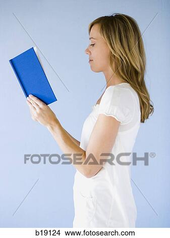Caucasian Appearance, Book, one young woman only, One Person, 25-29 years View Large Photo Image Picture - Caucasian Appearance, Book, one young woman only, One Person, 25-29 years. Fotosearch